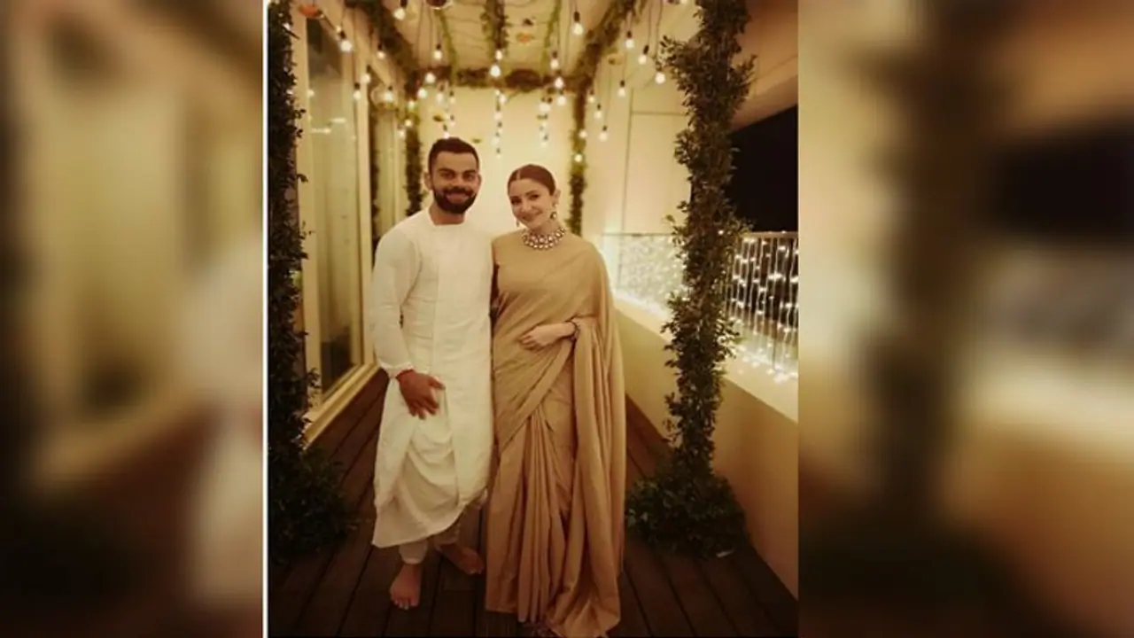 Virat Kohli, Anushka Sharma spotted at their new home in Juhu Virat Kohli, Anushka Sharma spotted at their new home in Juhu