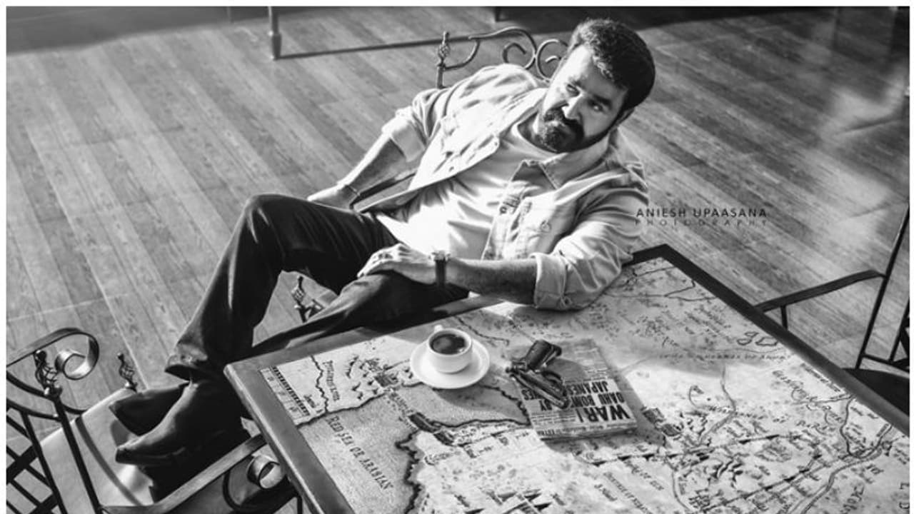 ആരെയോ പ്രതീക്ഷിച്ച് മോഹൻലാല്, തൊട്ടടുത്ത് ഒരു തോക്കും!, ഫോട്ടോ ഏറ്റെടുത്ത് ആരാധകര് ആരെയോ പ്രതീക്ഷിച്ച് മോഹൻലാല്, തൊട്ടടുത്ത് ഒരു തോക്കും!, ഫോട്ടോ ഏറ്റെടുത്ത് ആരാധകര്