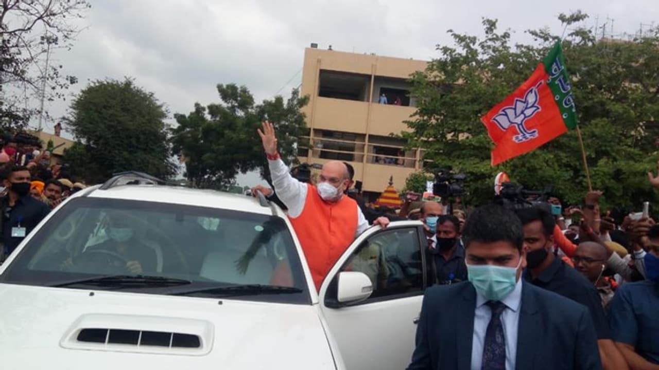 Home minister Amit Shah holds roadshow, says will transform Hyderabad into world class IT hub Home minister Amit Shah holds roadshow, says will transform Hyderabad into world class IT hub