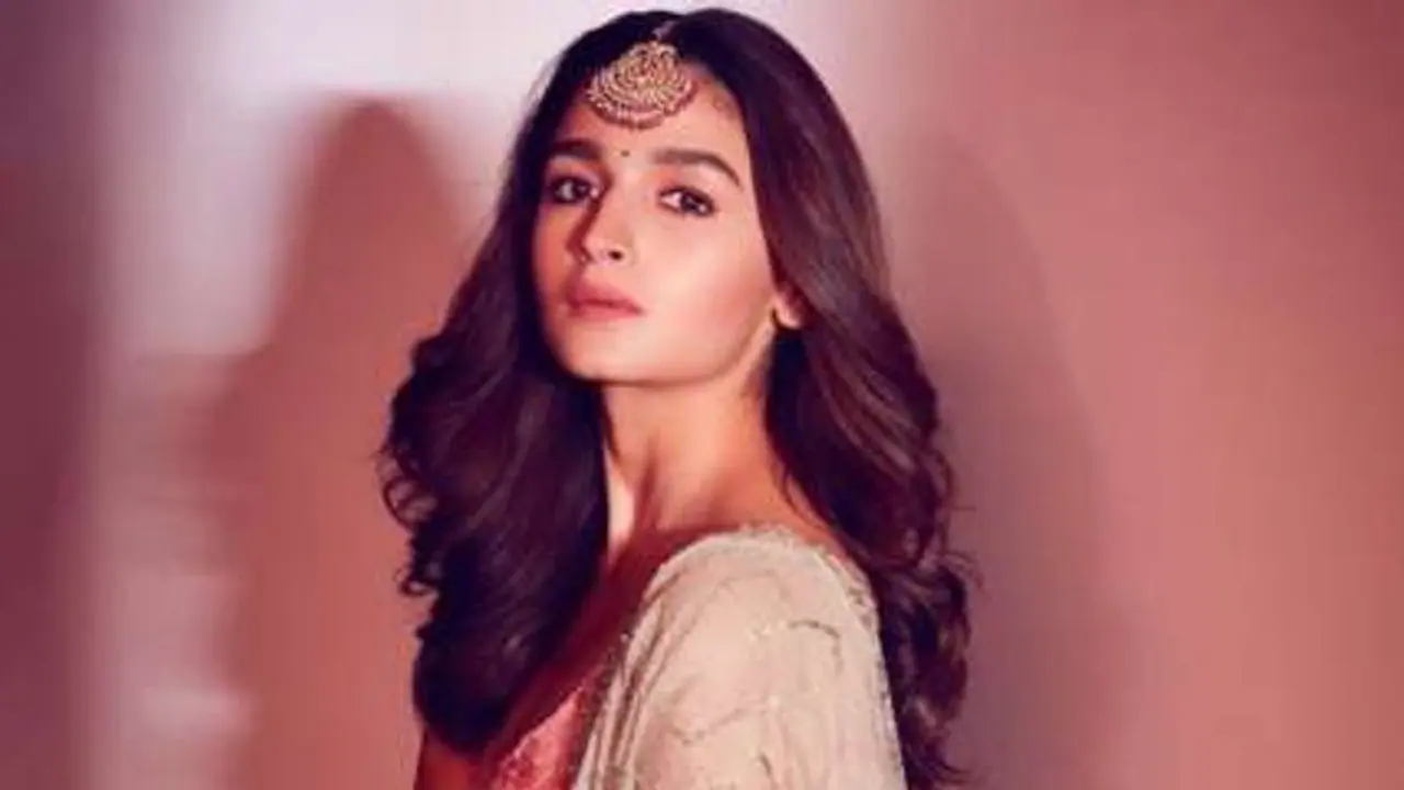 Alia Bhatt fighting a dilemma: Mentor Karan Johar’s talent management company or her existing? Alia Bhatt fighting a dilemma: Mentor Karan Johar’s talent management company or her existing?