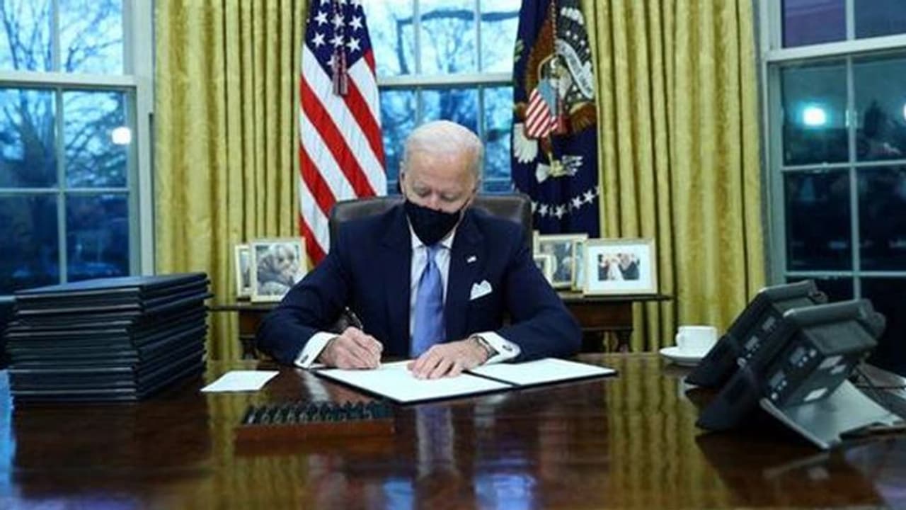 US President Joe Biden signs raft of COVID orders; passengers to quarantine on arrival, wider mask mandate US President Joe Biden signs raft of COVID orders; passengers to quarantine on arrival, wider mask mandate