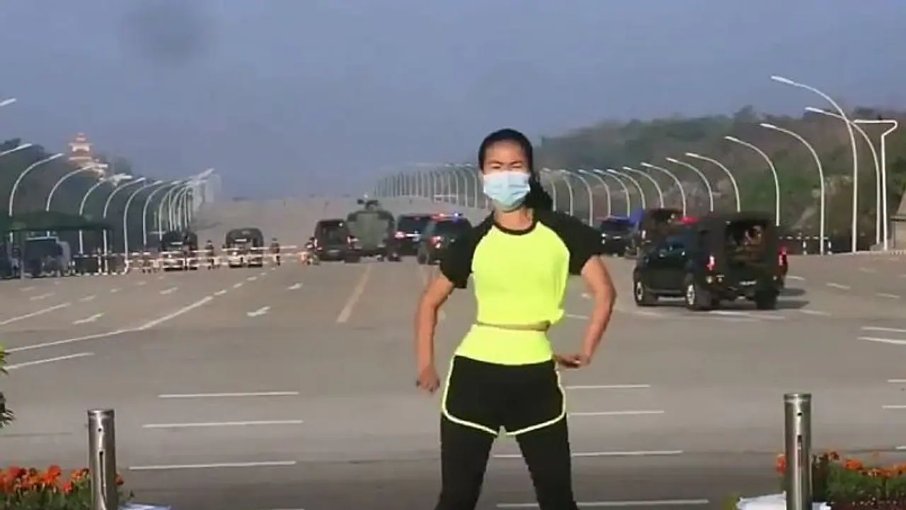 Fitness trainer who missed a coup unfolding behind her is a global sensation