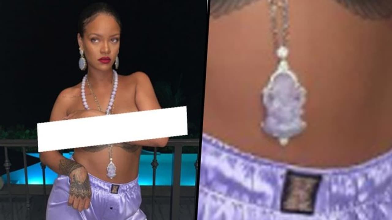 Rihanna called out for hurting sentiments, poses topless wearing Ganesha pendant