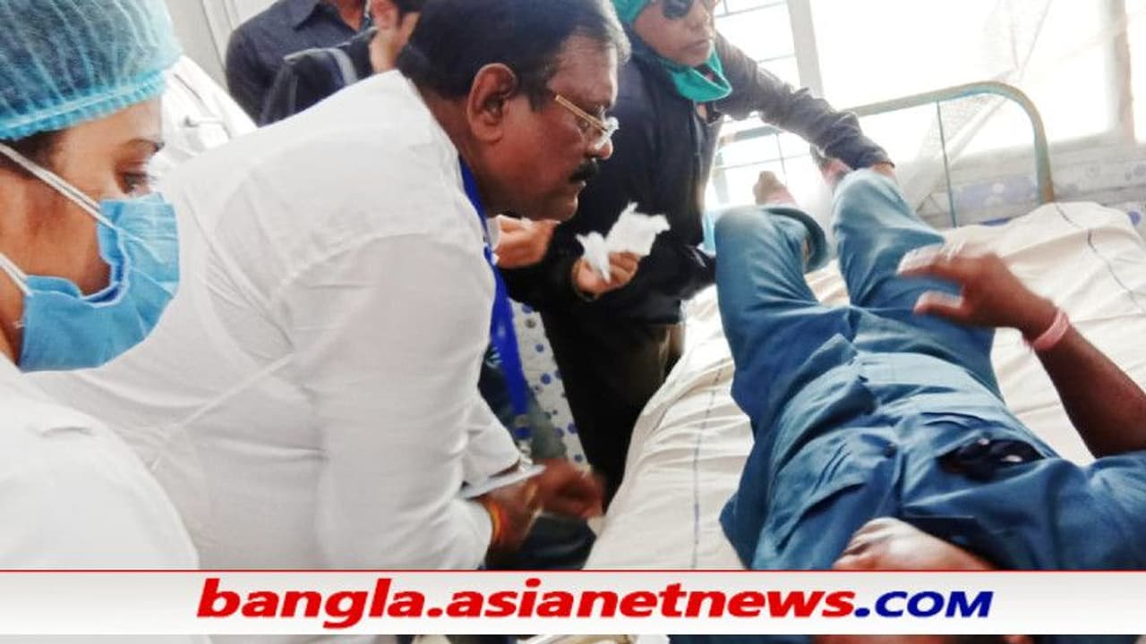 হেলমেট পরে পালাতে হল নির্মল মাজিকে, গ্রামবাসীদের ইটের ঘায়ে জখম মন্ত্রীর দেহরক্ষী