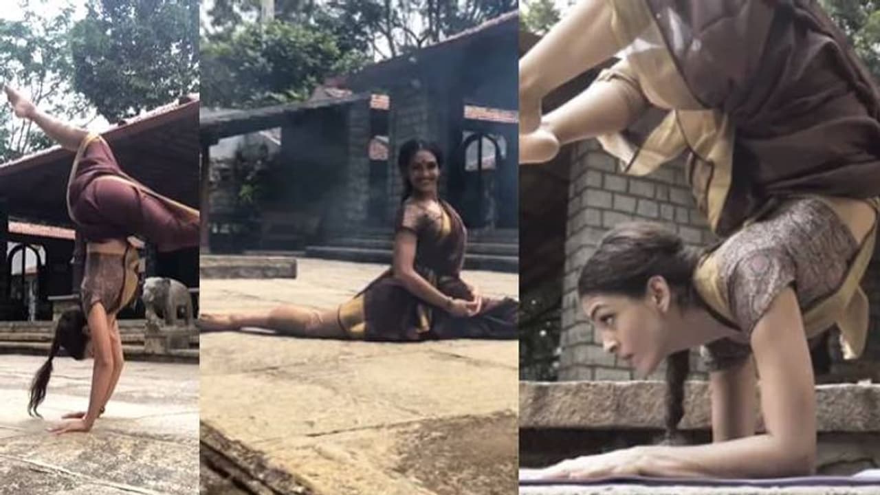 സാരിയുടുത്ത് തലകുത്തി മറിയുന്ന നര്ത്തകി; വീഡിയോ വൈറല് സാരിയുടുത്ത് തലകുത്തി മറിയുന്ന നര്ത്തകി; വീഡിയോ വൈറല്