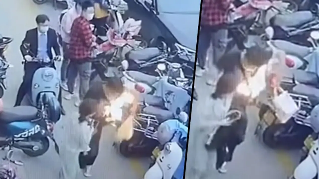 Mobile Phone bursts into flames inside man's bag, Watch the viral video Mobile Phone bursts into flames inside man's bag, Watch the viral video