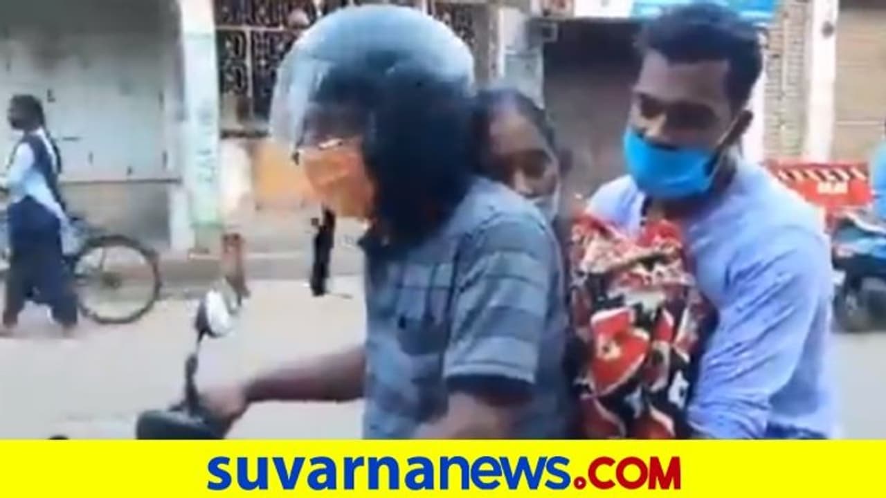 ಆಂಬುಲೆನ್ಸ್ ಇಲ್ಲ: ಸೋಂಕಿತೆಯ ಮೃತದೇಹ ಬೈಕಲ್ಲಿ ಒಯ್ದ ಮಗ ಆಂಬುಲೆನ್ಸ್ ಇಲ್ಲ: ಸೋಂಕಿತೆಯ ಮೃತದೇಹ ಬೈಕಲ್ಲಿ ಒಯ್ದ ಮಗ