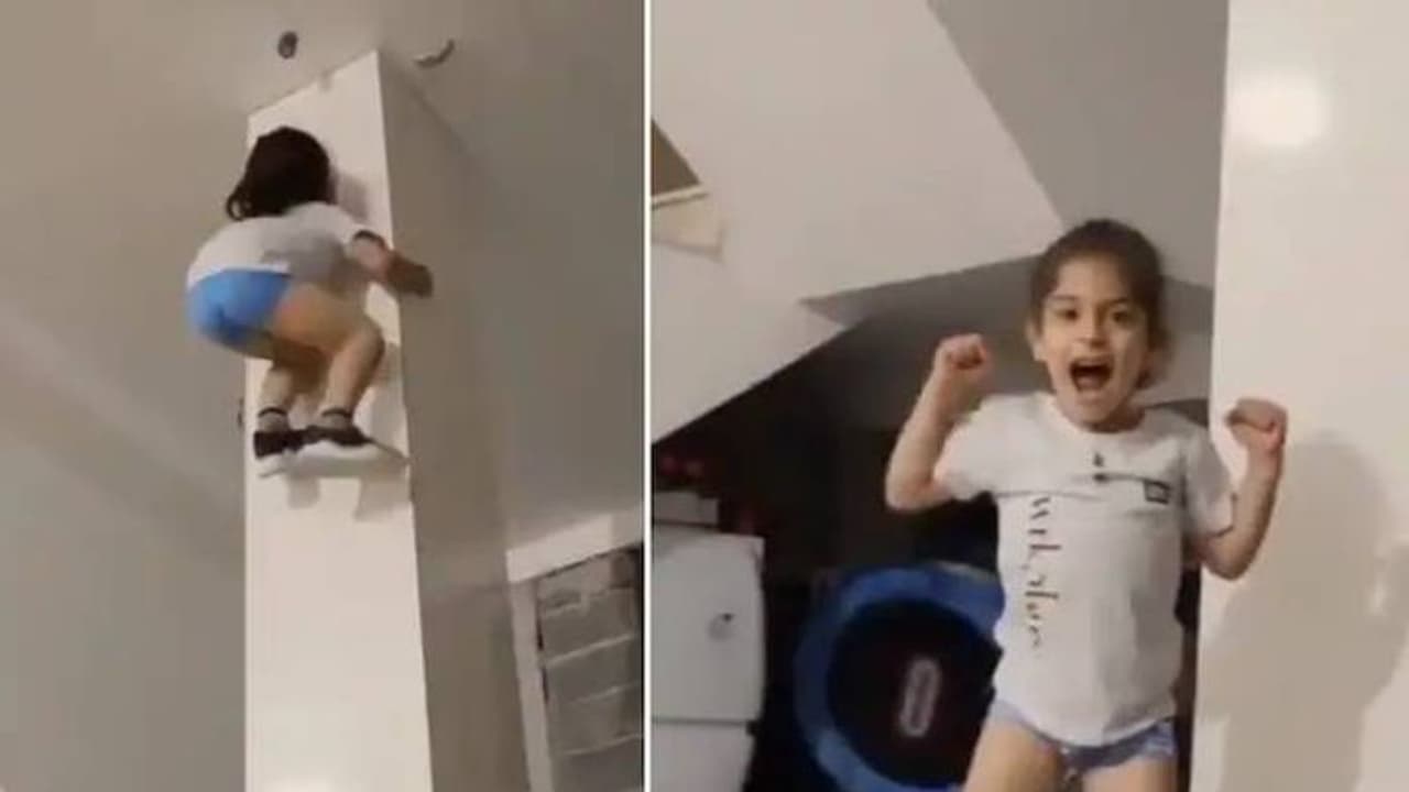 തൂണില്‍ വലിഞ്ഞു കയറാൻ ശ്രമിക്കുന്ന ഏഴുവയസുകാരാന്‍; വൈറലായി വീഡിയോ