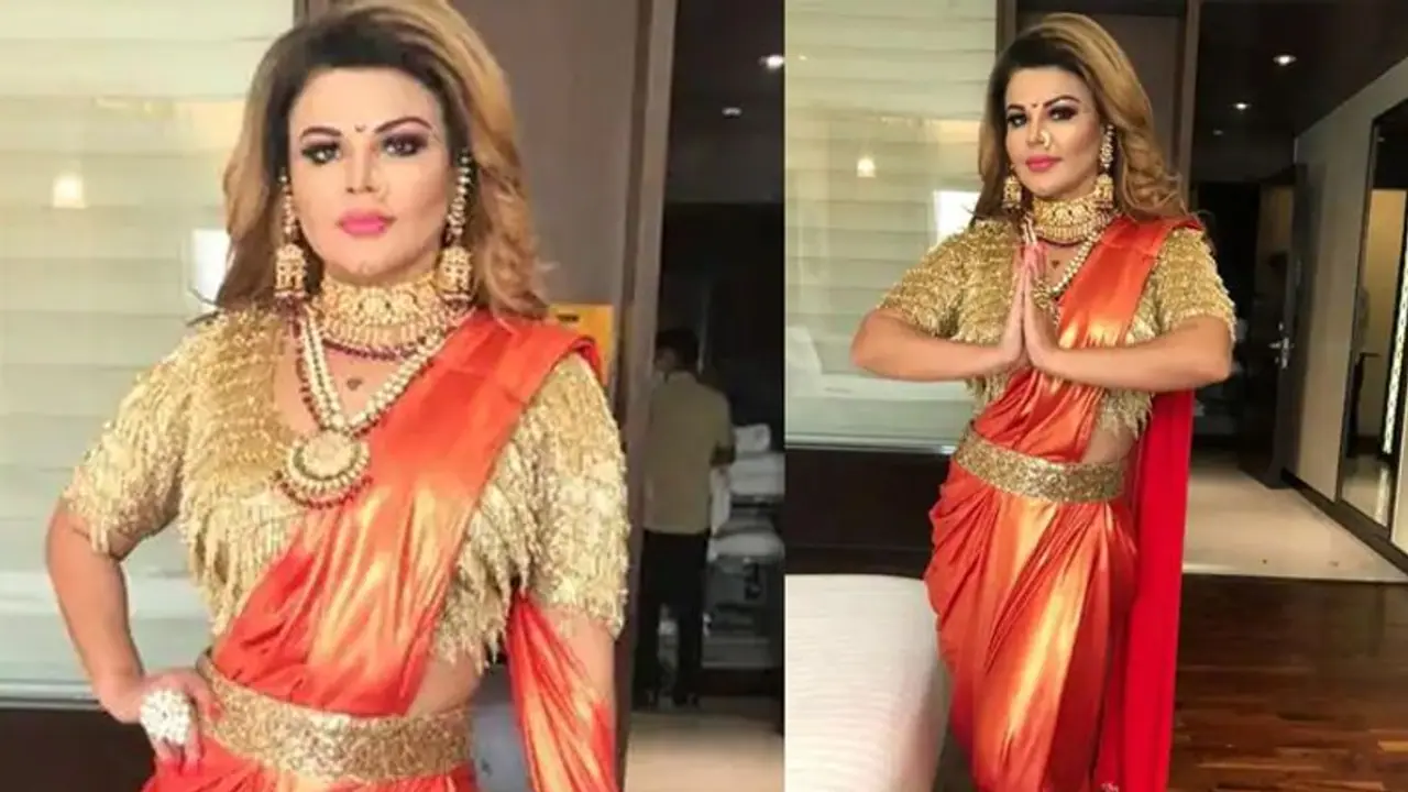 Bollywood Update: इस बार इंडियन आइडल में डांस का तड़का लगाएंगी राखी सावंत, इस लुक में आएंगी नजर Bollywood Update: इस बार इंडियन आइडल में डांस का तड़का लगाएंगी राखी सावंत, इस लुक में आएंगी नजर