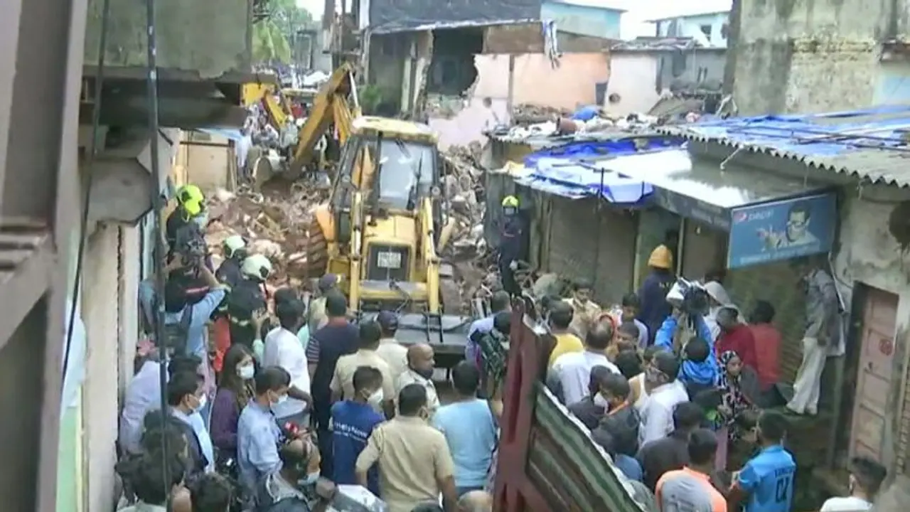 11 dead in Mumbai building collapse, heavy rains continue to lash city 11 dead in Mumbai building collapse, heavy rains continue to lash city