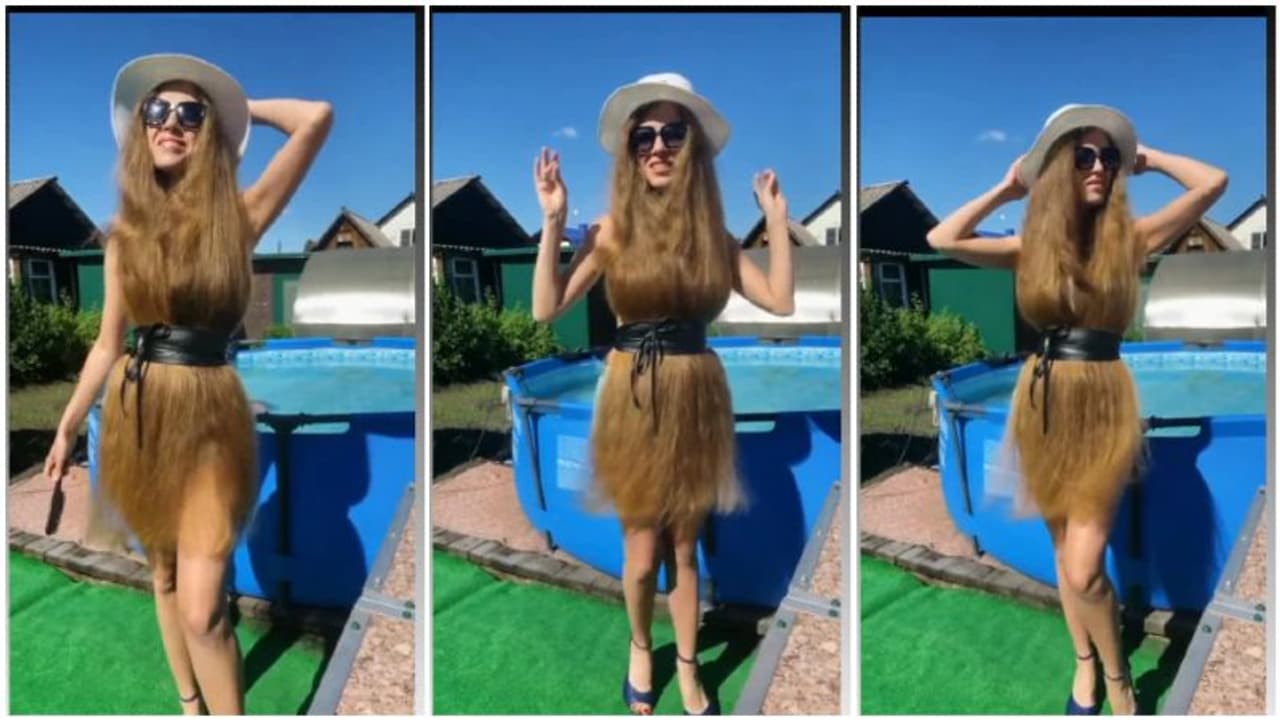 ടോപ്പില്ല, സ്കര്ട്ടില്ല, നീളന് മുടി വസ്ത്രമാക്കി ധരിച്ച് ഒരു പെണ്കുട്ടി! ടോപ്പില്ല, സ്കര്ട്ടില്ല, നീളന് മുടി വസ്ത്രമാക്കി ധരിച്ച് ഒരു പെണ്കുട്ടി!