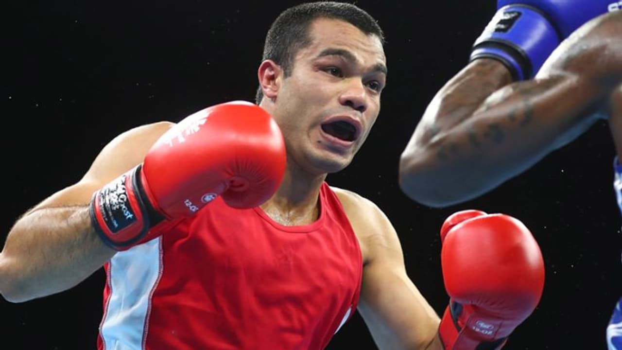 టోక్యో ఒలింపిక్స్: తొలి రౌండ్లోనే ఓడిన భారత బాక్సర్ వికాస్ కృష్ణన్... రక్తం కారుతున్నా పోరాడి... టోక్యో ఒలింపిక్స్: తొలి రౌండ్లోనే ఓడిన భారత బాక్సర్ వికాస్ కృష్ణన్... రక్తం కారుతున్నా పోరాడి...