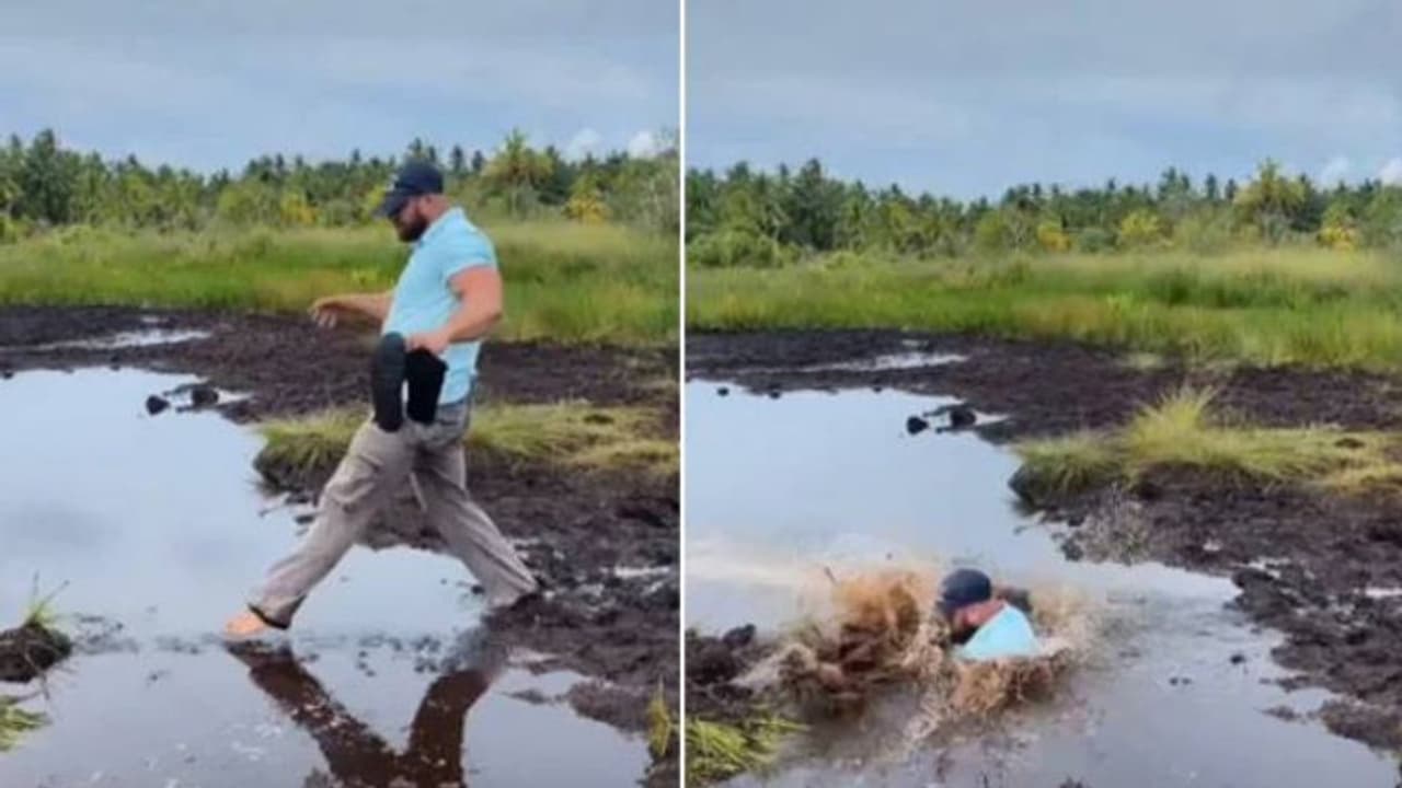 ചെളിവെള്ളത്തിൽ മുങ്ങി ഭർത്താവ്, പൊട്ടിച്ചിരിച്ച് ഭാര്യ, വീഡിയോ വൈറൽ