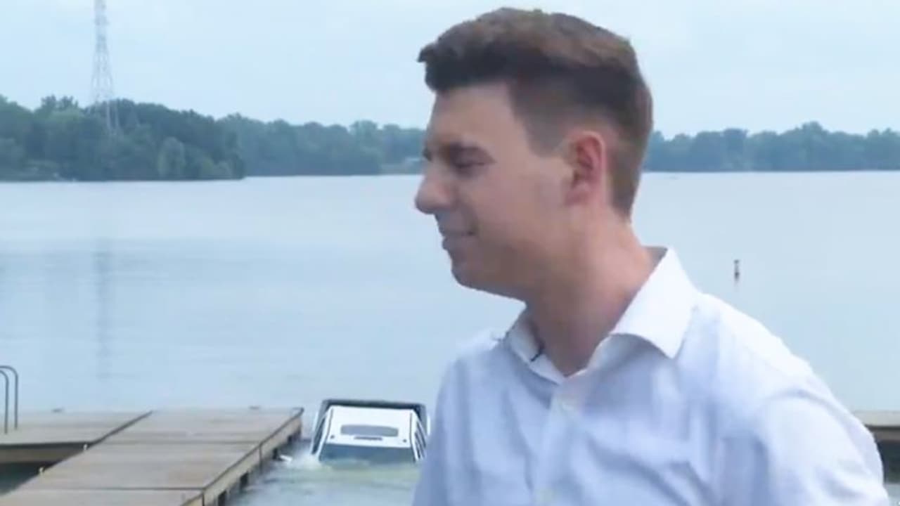 Shocking video of a parked car sinking into lake during live news coverage; leaves netizens in splits
