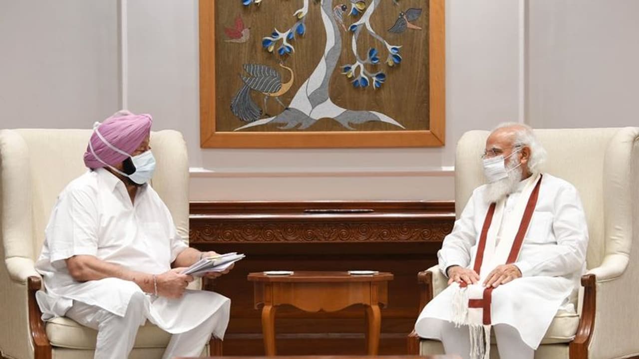 PM Modi से मिले कैप्टन अमरिंदर, बोले तीनों कृषि कानून हो रद्द, आंदोलन से आर्थिक गतिविधियां हो रही प्रभावित PM Modi से मिले कैप्टन अमरिंदर, बोले तीनों कृषि कानून हो रद्द, आंदोलन से आर्थिक गतिविधियां हो रही प्रभावित