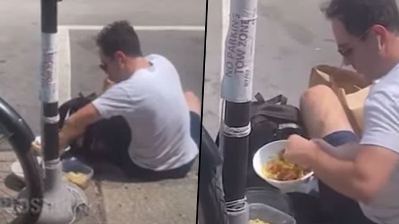 Food delivery guy steals customer's food; viral video shocks netizens Food delivery guy steals customer's food; viral video shocks netizens