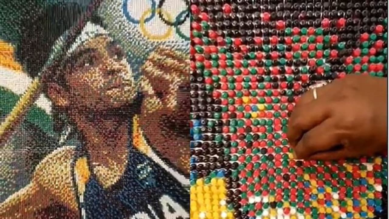 ಮೊಸಾಯಿಕ್ ಕಲಾವಿದನ ಕೈಯಲ್ಲಿ ಅರಳಿತು ಚಿನ್ನದ ಹುಡುಗ ನೀರಜ್ ಜೋಪ್ರಾ ಭಾವಚಿತ್ರ! ಮೊಸಾಯಿಕ್ ಕಲಾವಿದನ ಕೈಯಲ್ಲಿ ಅರಳಿತು ಚಿನ್ನದ ಹುಡುಗ ನೀರಜ್ ಜೋಪ್ರಾ ಭಾವಚಿತ್ರ!