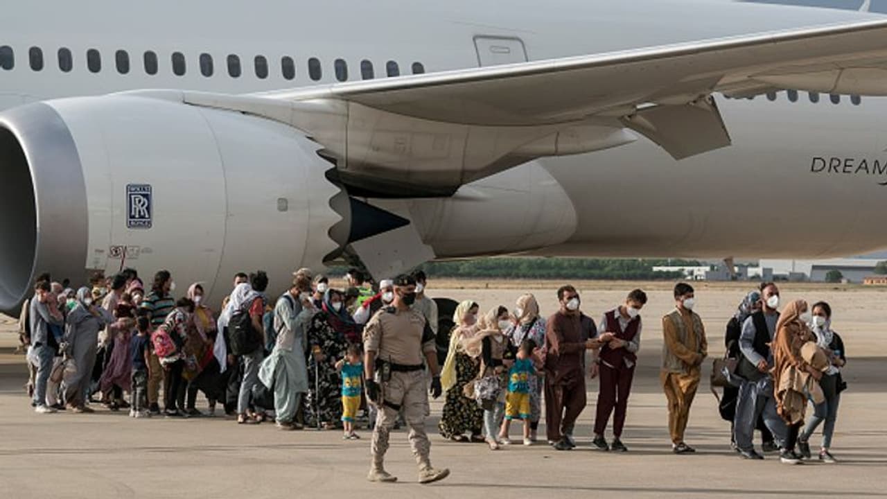 Afghan girl, born on US military plane, named 'Reach', after aircraft's code name Afghan girl, born on US military plane, named 'Reach', after aircraft's code name