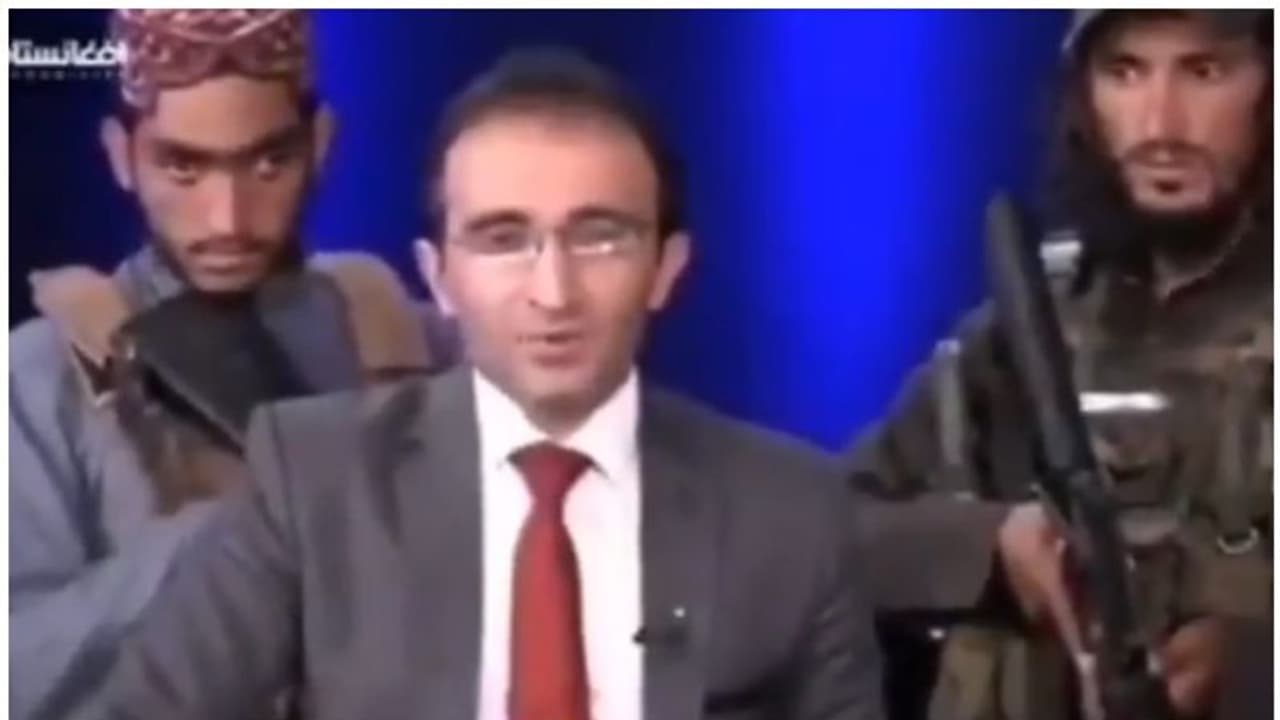 Viral Video: প্রাণ হাতে নিয়ে খবর পড়ছেন আফগান সঞ্চালক, বলছেন 'ভয় নেই তালিবান রাজত্বে' Viral Video: প্রাণ হাতে নিয়ে খবর পড়ছেন আফগান সঞ্চালক, বলছেন 'ভয় নেই তালিবান রাজত্বে'