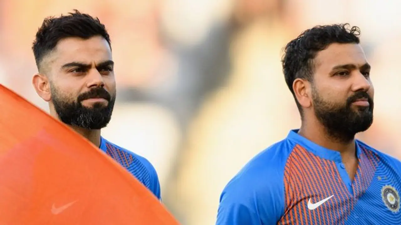 ವಿರಾಟ್ ಕೊಹ್ಲಿ ಮೊದಲ ಏಕದಿನ ಪಂದ್ಯದಿಂದ ಹೊರಬಿದ್ದಿದ್ದೇಕೆ? ಮೌನ ಮುರಿದ ನಾಯಕ ರೋಹಿತ್ ಶರ್ಮಾ ವಿರಾಟ್ ಕೊಹ್ಲಿ ಮೊದಲ ಏಕದಿನ ಪಂದ್ಯದಿಂದ ಹೊರಬಿದ್ದಿದ್ದೇಕೆ? ಮೌನ ಮುರಿದ ನಾಯಕ ರೋಹಿತ್ ಶರ್ಮಾ