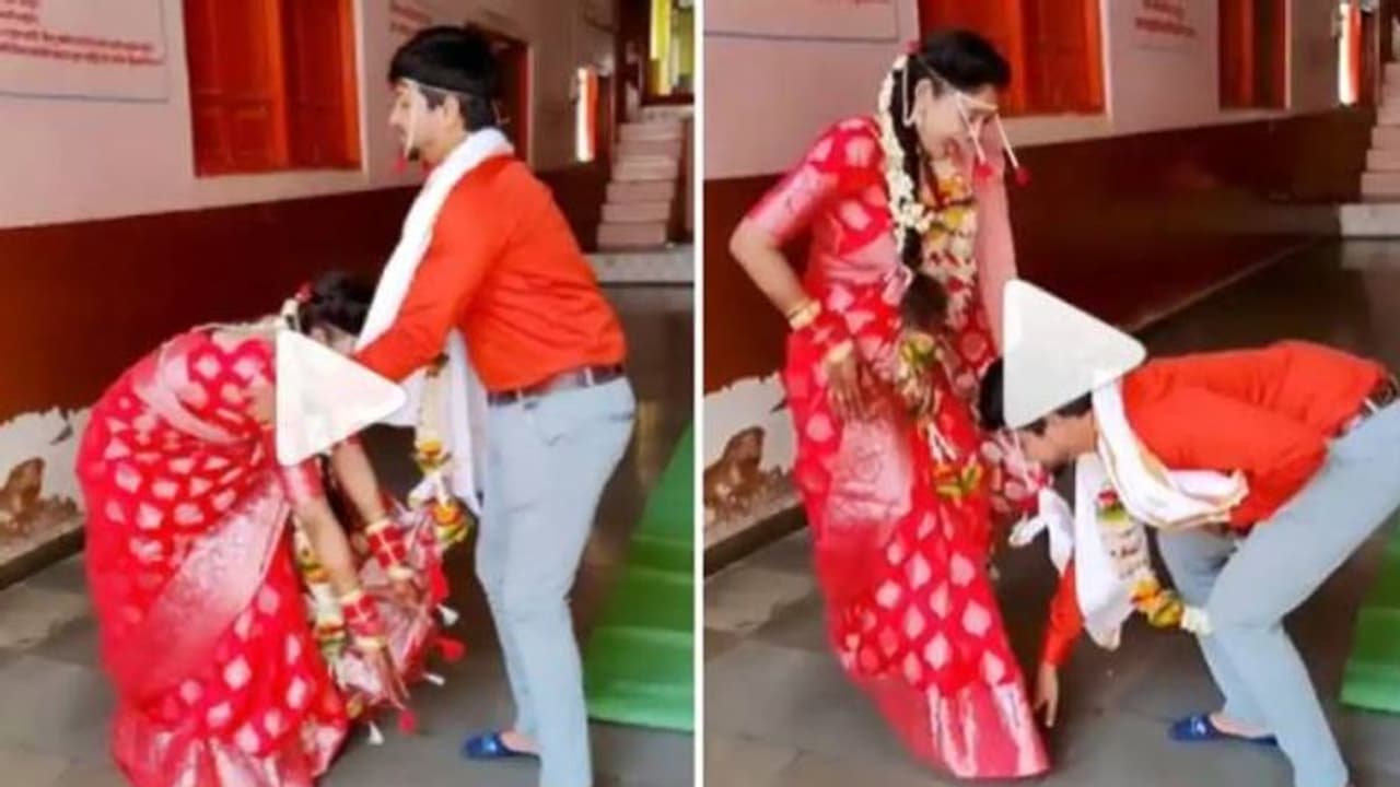 തന്റെ പാദം സ്പർശിക്കുന്ന വധുവിനെ തടഞ്ഞ് വരൻ, വധുവിന്റെ പാദം തൊട്ടു, അഭിനന്ദിച്ച് സോഷ്യൽ മീഡിയ തന്റെ പാദം സ്പർശിക്കുന്ന വധുവിനെ തടഞ്ഞ് വരൻ, വധുവിന്റെ പാദം തൊട്ടു, അഭിനന്ദിച്ച് സോഷ്യൽ മീഡിയ