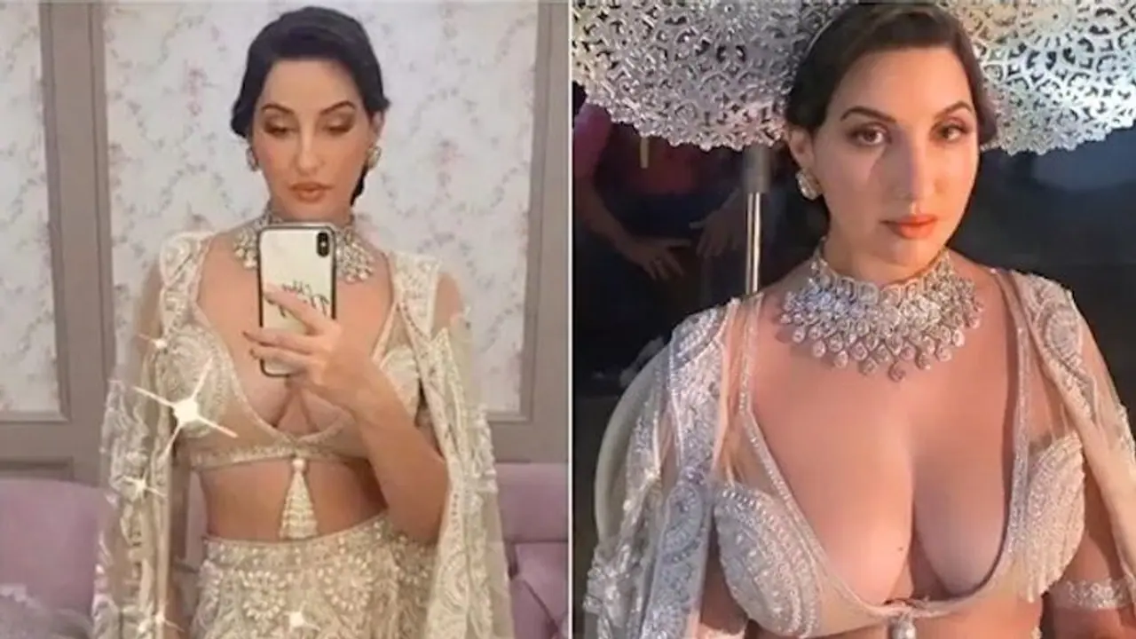 Nora Fatehi gets mixed reactions for showing too much in a thigh slit lehenga, neck deep blouse (Video)