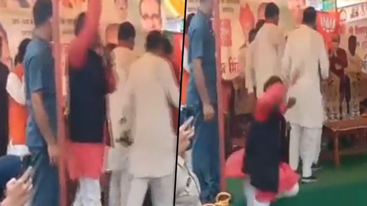 BJP leader falls off stage while supporting MP CM Shivraj Singh Chouhan; watch video BJP leader falls off stage while supporting MP CM Shivraj Singh Chouhan; watch video
