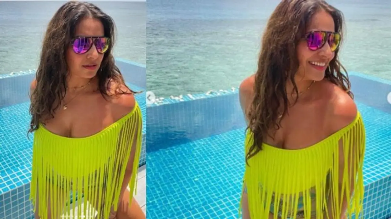 നിയോൺ ഗ്രീൻ ഔട്ട്ഫിറ്റില്‍ തിളങ്ങി ബിപാഷ ബസു; വസ്ത്രത്തെ ട്രോളി സോഷ്യല്‍ മീഡിയ