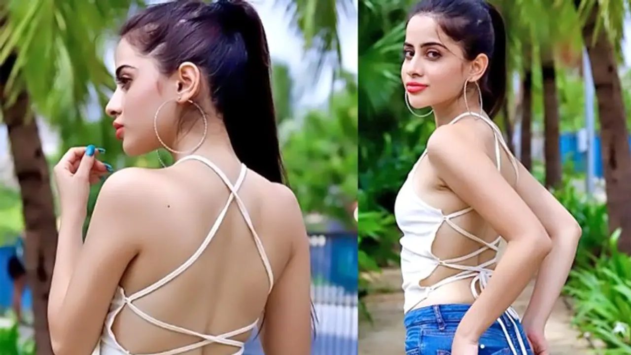 ముందు జిప్ వేసులో... బిగ్ బాస్ బ్యూటీ డ్రెస్ పై నెటిజెన్స్ హాట్ కామెంట్స్