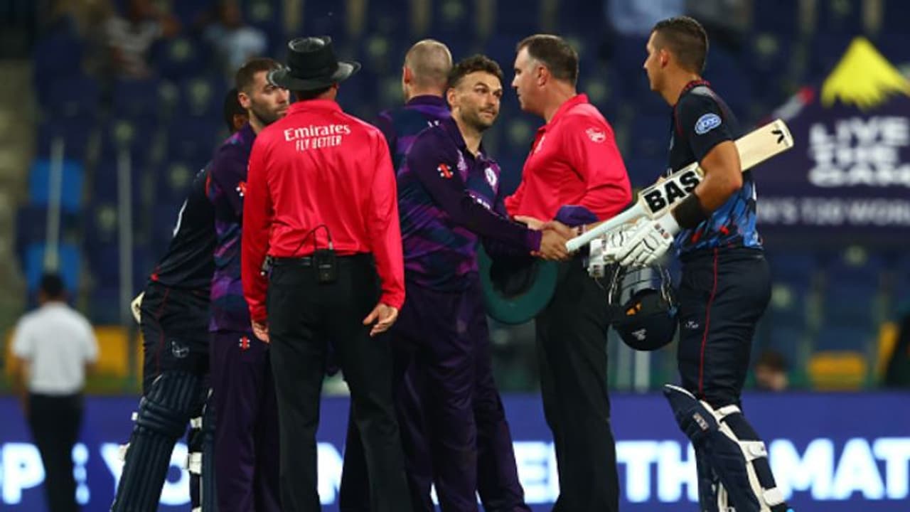 T20 WC 2021, SCO vs NAM ইতিহাস লিখল নামিবিয়া, বিশ্বকাপের প্রথম ম্যাচেই স্কটল্যান্ডকে হারাল ৪ উইকেটে T20 WC 2021, SCO vs NAM ইতিহাস লিখল নামিবিয়া, বিশ্বকাপের প্রথম ম্যাচেই স্কটল্যান্ডকে হারাল ৪ উইকেটে