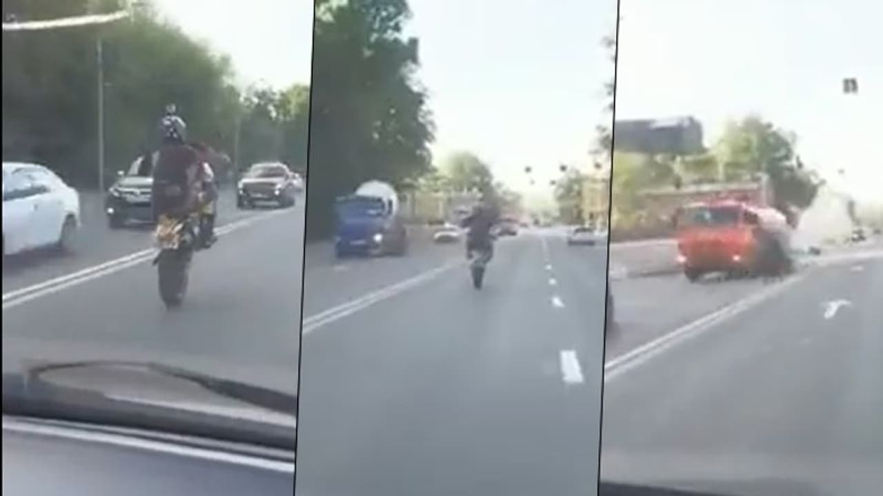 Watch: Biker doing wheelie stunt crashes with the tanker; video goes viral