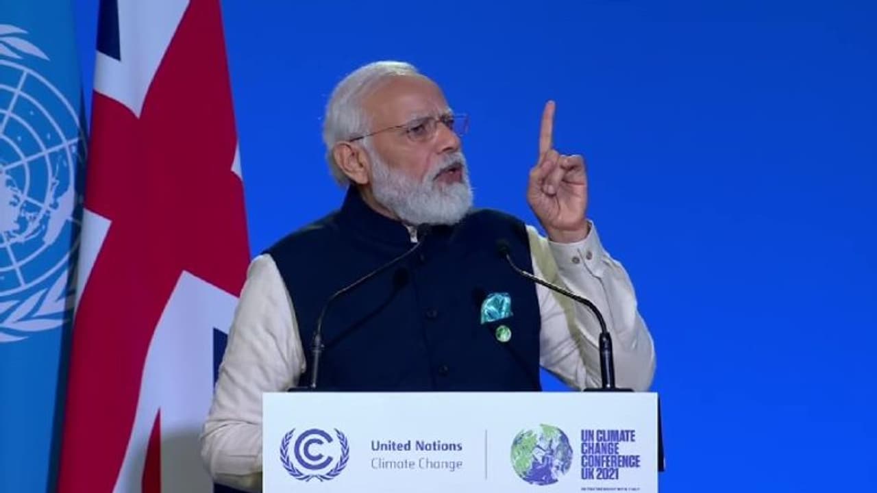 Climate Summit: জলবায়ু বৈঠকে প্রধানমন্ত্রী মোদীর 'পঞ্চামৃত', লক্ষ্যমাত্রা পুরণের সময় চিন আমেরিকার পরে Climate Summit: জলবায়ু বৈঠকে প্রধানমন্ত্রী মোদীর 'পঞ্চামৃত', লক্ষ্যমাত্রা পুরণের সময় চিন আমেরিকার পরে