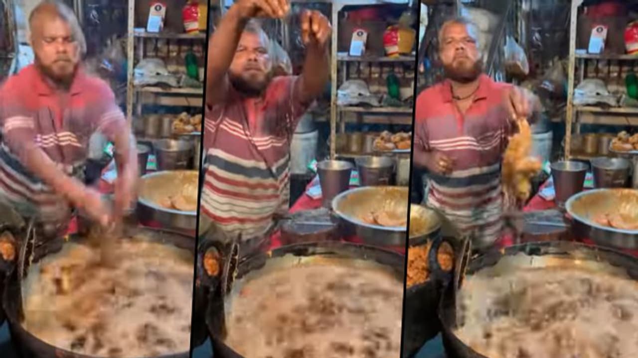 SHOCKING: Street vendor dipping his hands in hot oil to fry chicken (Viral Video) SHOCKING: Street vendor dipping his hands in hot oil to fry chicken (Viral Video)