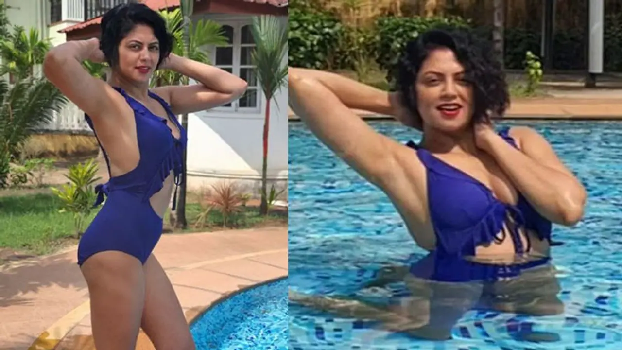 बाल कटवाने के बाद Kavita Kaushik नीली बिकिनी में आई नजर, पूल में दिखा रही थी कातिलाना अदाएं बाल कटवाने के बाद Kavita Kaushik नीली बिकिनी में आई नजर, पूल में दिखा रही थी कातिलाना अदाएं