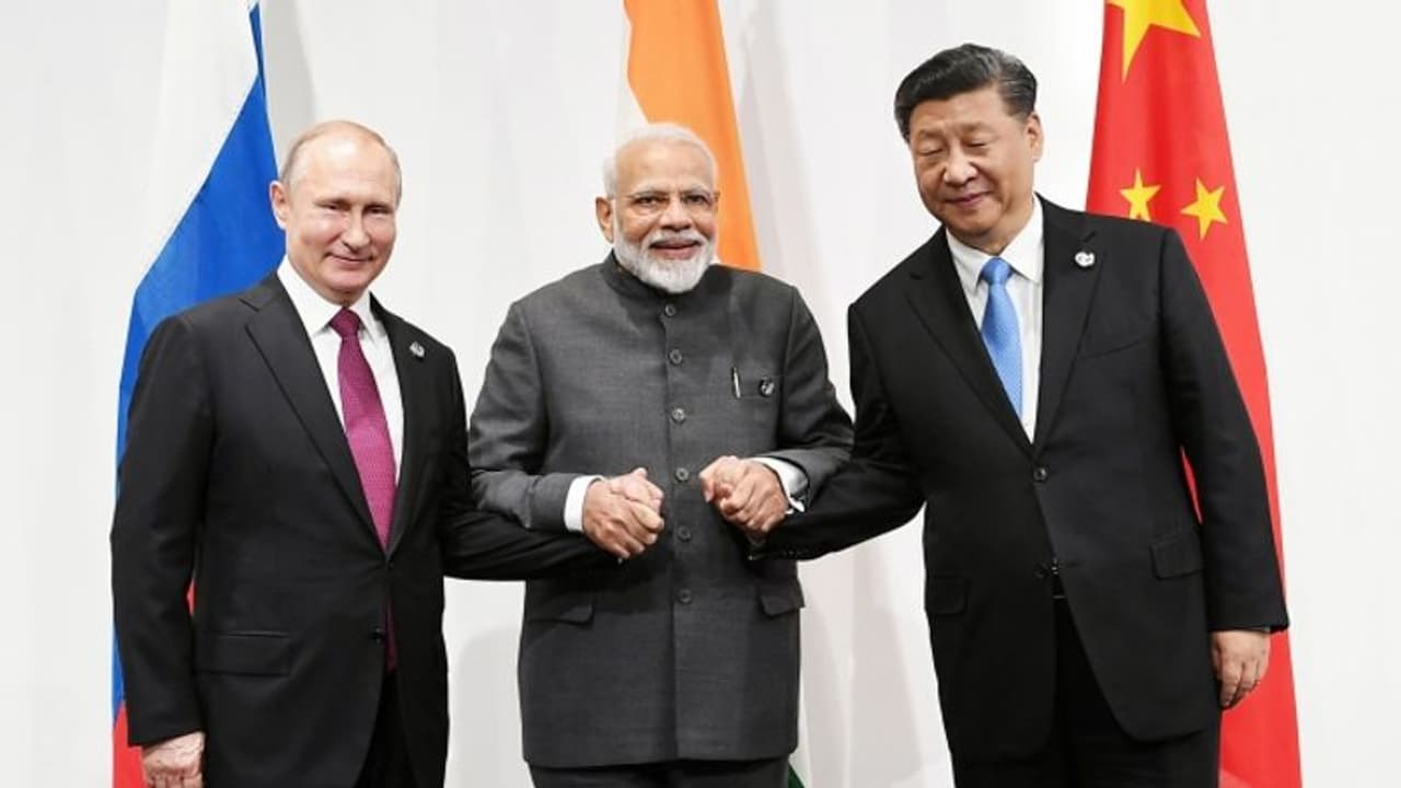Vladimir Putin's aide says Russia, India and China to hold summit very soon Vladimir Putin's aide says Russia, India and China to hold summit very soon
