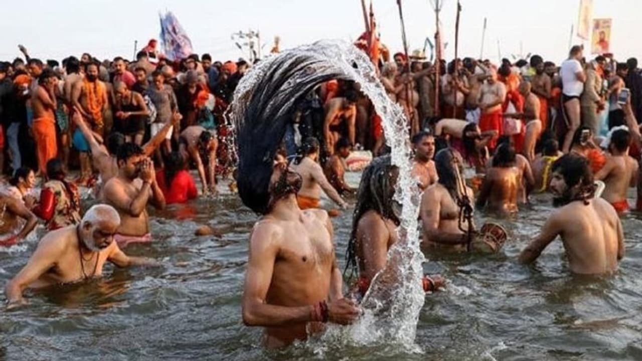 bathing in Magh Mela