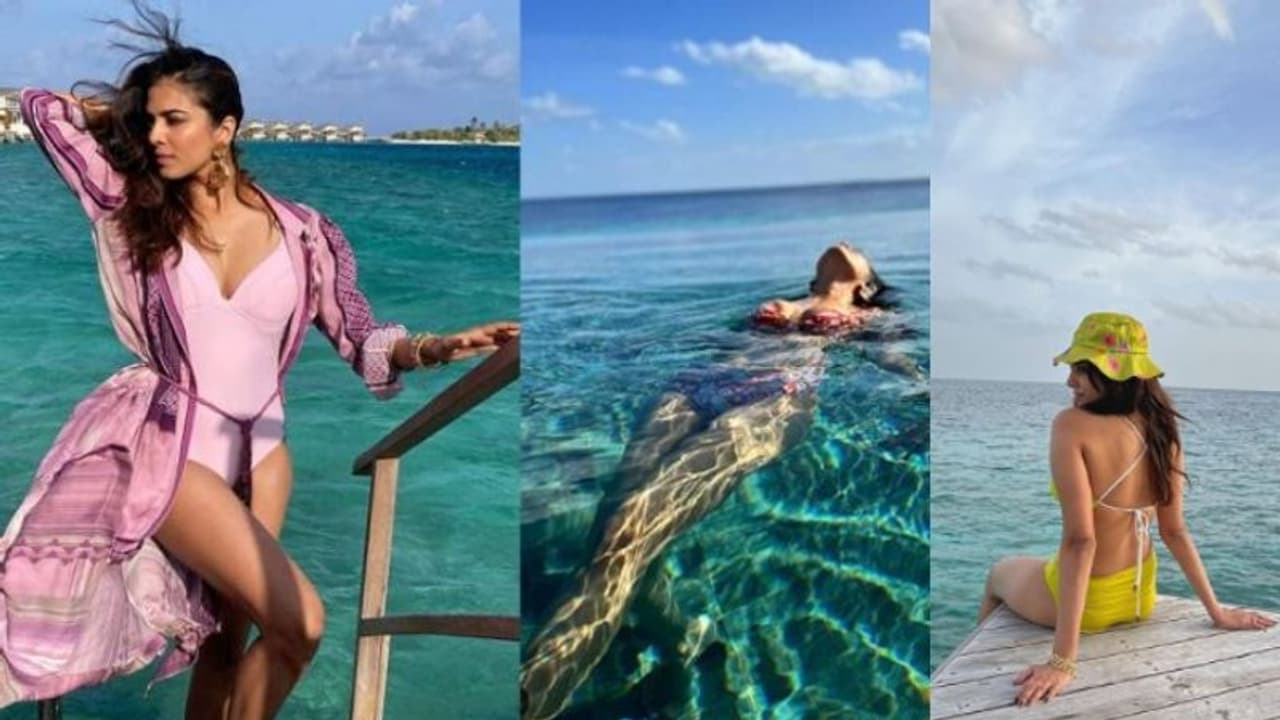 Malavika Mohanan Photos: സ്വിം സ്യൂട്ടിൽ മനോഹരിയായി മാളവിക മോഹനൻ; ചിത്രങ്ങള്‍...