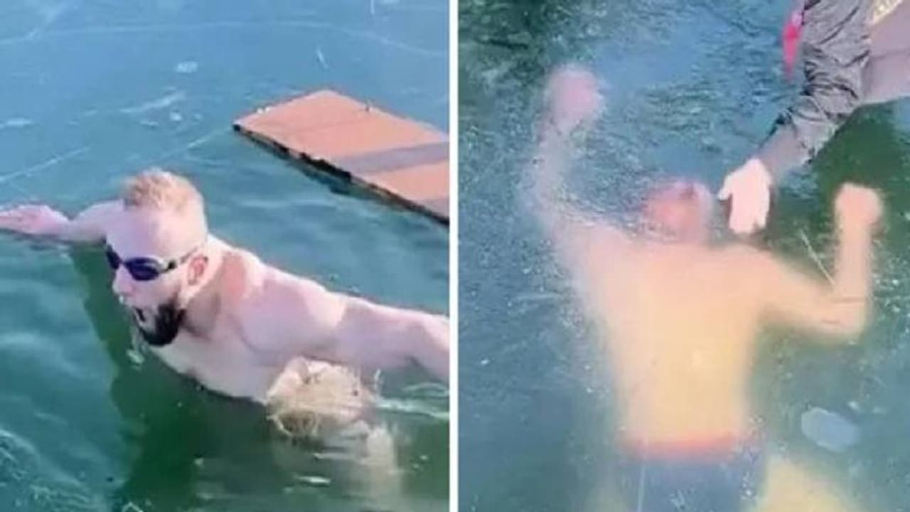 Man swims under frozen lake : തണുത്തുറഞ്ഞ തടാകത്തിലേക്ക് എടുത്തുചാടി യുവാവ്, ശ്വാസംപോലും കിട്ടാതെ പരാക്രമം Man swims under frozen lake : തണുത്തുറഞ്ഞ തടാകത്തിലേക്ക് എടുത്തുചാടി യുവാവ്, ശ്വാസംപോലും കിട്ടാതെ പരാക്രമം