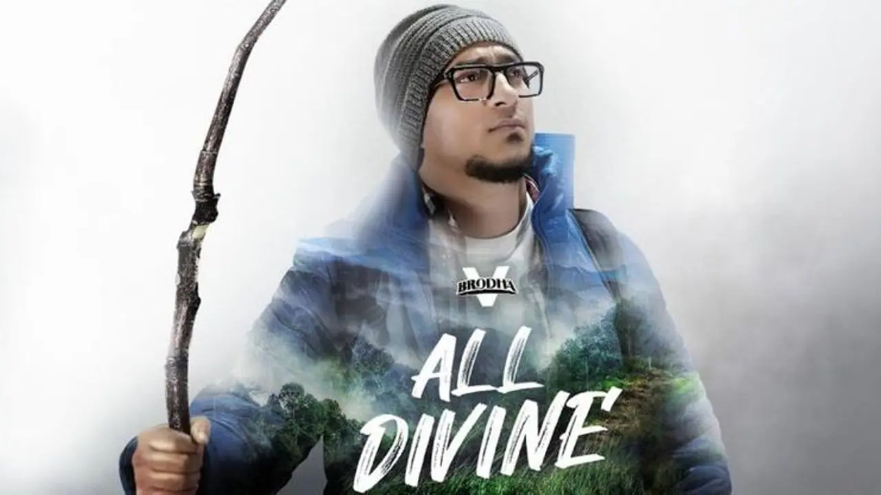 Brodha V : റാപ് സോങ് മാജിക്കിൽ ത്രസിപ്പിച്ച് ബ്രോധ വി; തരംഗം തീർത്ത് 'ആൾ ഡിവൈൻ' Brodha V : റാപ് സോങ് മാജിക്കിൽ ത്രസിപ്പിച്ച് ബ്രോധ വി; തരംഗം തീർത്ത് 'ആൾ ഡിവൈൻ'