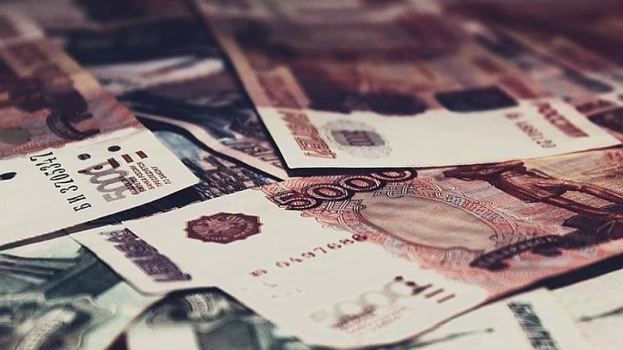 Russian Ruble in rubble as sanctions strike, people rush to banks