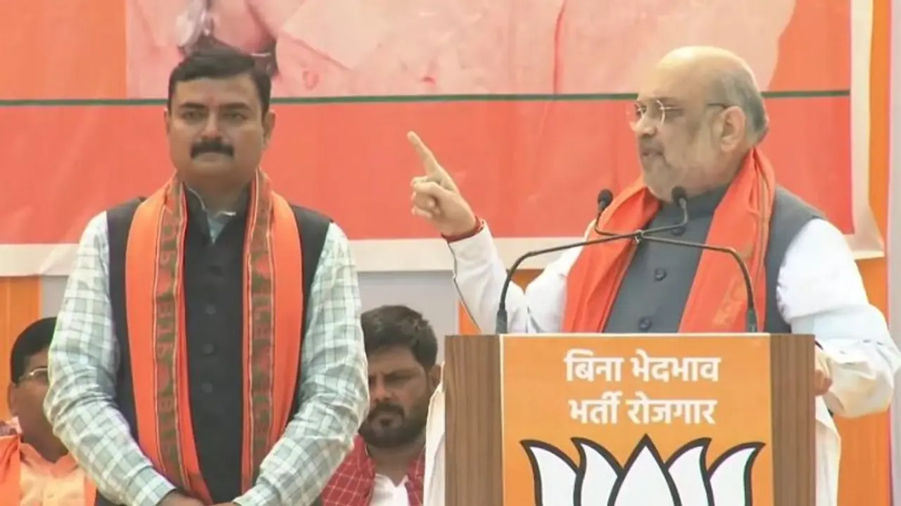 यूपी चुनाव: अमित शाह बोले बाहुबलियों को नहीं ऐसे प्रत्याशियों को जिताएं जिसके DNA में सेवा का संस्कार हो यूपी चुनाव: अमित शाह बोले बाहुबलियों को नहीं ऐसे प्रत्याशियों को जिताएं जिसके DNA में सेवा का संस्कार हो