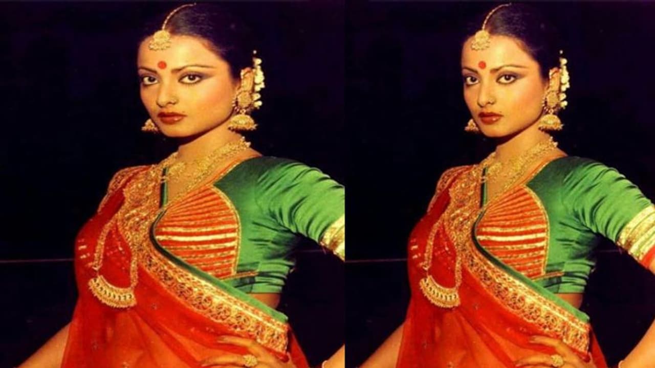 শরীরের এত জায়গা থাকতে ঠোঁটেই কেন চুম্বন? 'লিপ লক' নিয়ে চরম বিতর্কে এভারগ্রীন রেখা