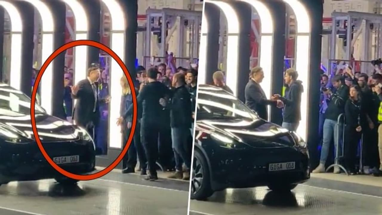 Elon Musk dances as he hands over Teslas from new German Gigafactory