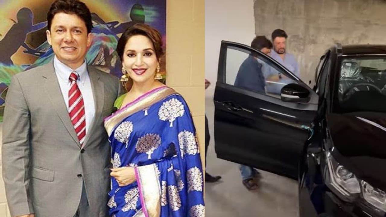 माधुरी दीक्षित के पति ने खरीदी पहली इलेक्ट्रिक Tata Nexon EV, दिखाई अपनी शानदार कार की झलक माधुरी दीक्षित के पति ने खरीदी पहली इलेक्ट्रिक Tata Nexon EV, दिखाई अपनी शानदार कार की झलक