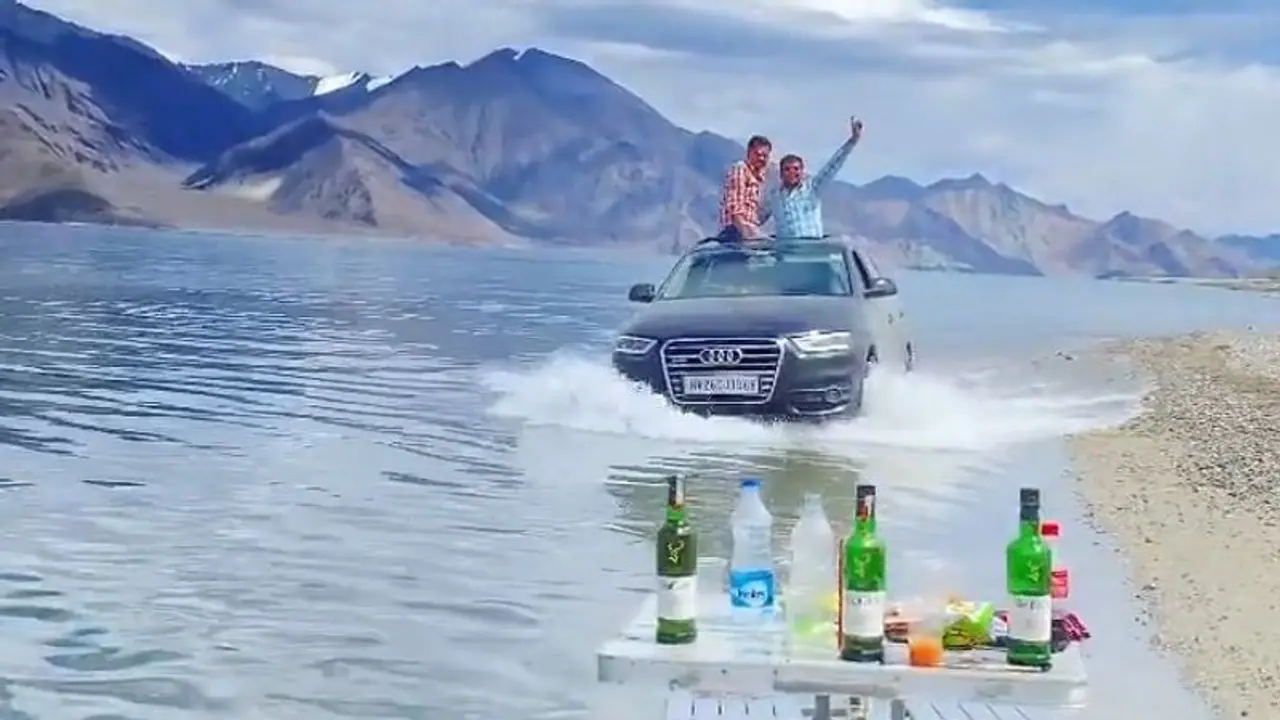 Tourists driving SUV through Ladakh's Pangong Lake irks netizens
