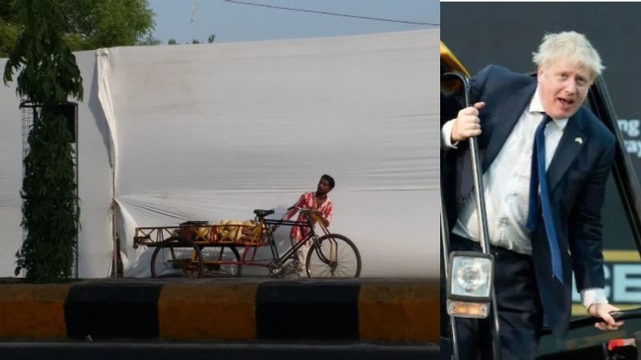 Boris Johnson : ബോറിസ് ജോൺസണെ കാണിക്കാതെ ഗുജറാത്തിലെ ചേരികൾ, തുണികെട്ടി മറച്ചു Boris Johnson : ബോറിസ് ജോൺസണെ കാണിക്കാതെ ഗുജറാത്തിലെ ചേരികൾ, തുണികെട്ടി മറച്ചു