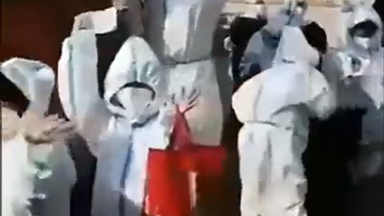 Watch: Unsettling video of children in PPE kits in Shanghai goes viral
