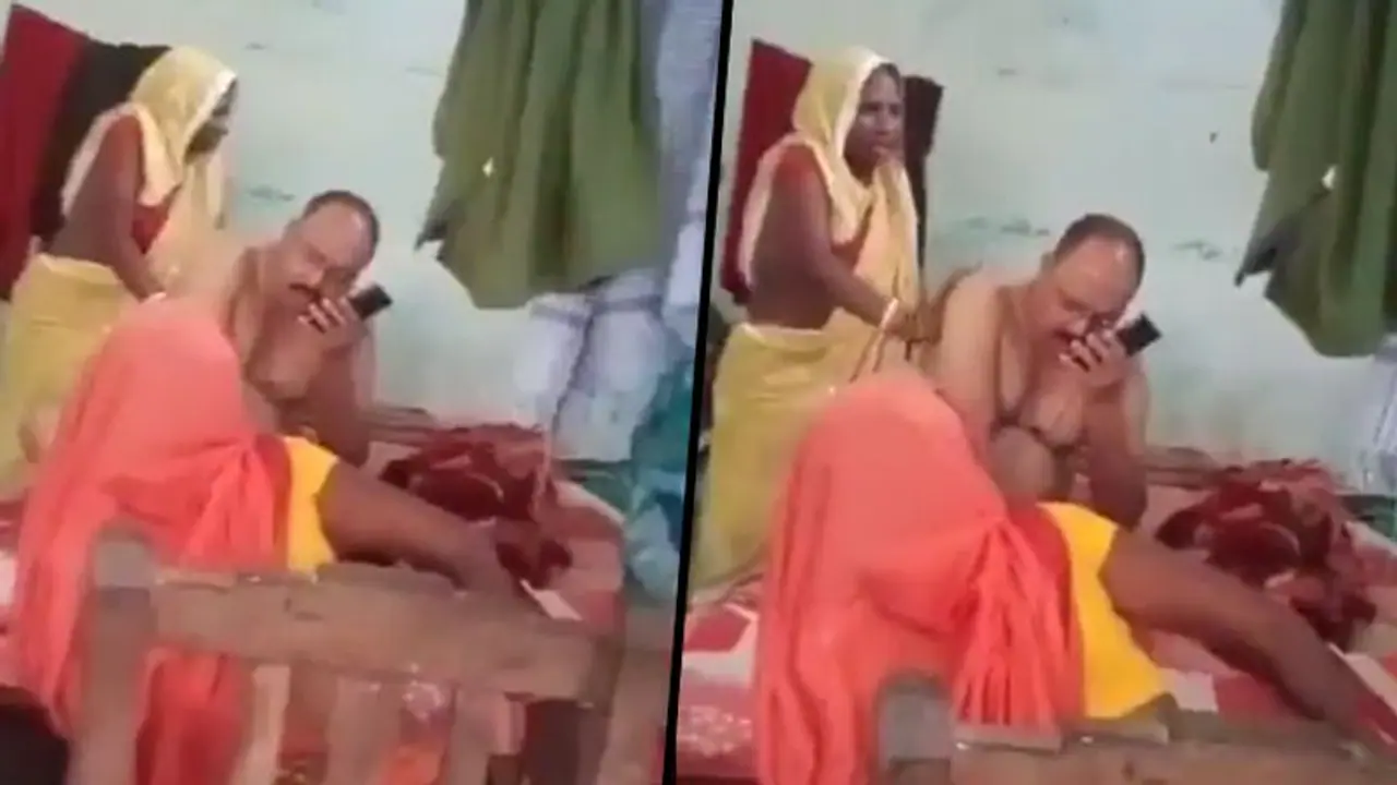 Bihar woman gives massage to cop inside police station; video goes viral Bihar woman gives massage to cop inside police station; video goes viral