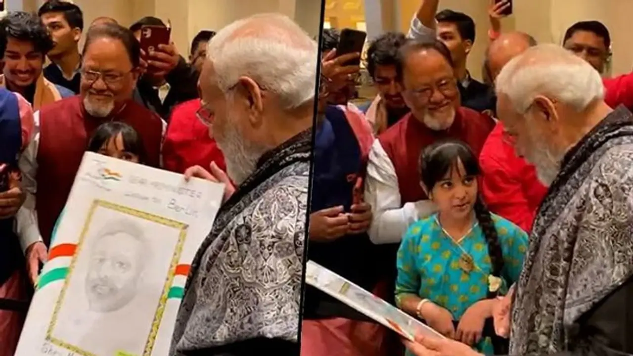 Indian girl in Berlin makes a portrait of PM Modi, gets an autograph Indian girl in Berlin makes a portrait of PM Modi, gets an autograph