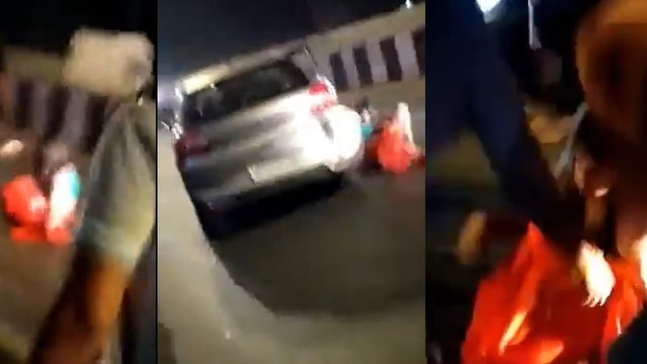 சண்டையை தடுக்க சென்ற பெண்ணிற்கு நேர்ந்த விபரீதம்.. காரில் தரதரவென்று இழித்து சென்று கொடூரம்.. வெளியான சிசிடிவி